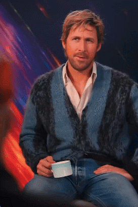 A Man In A Blue Sweater Is Holding A Cup And Says The Math Ain T Matching GIF