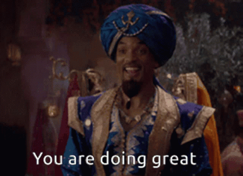 A Man In A Blue Turban Is Smiling And Says You Are Doing Great GIF