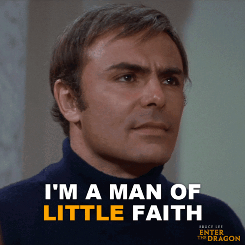 A Man In A Blue Turtleneck Sweater Says I 'M A Man Of Little Faith GIF