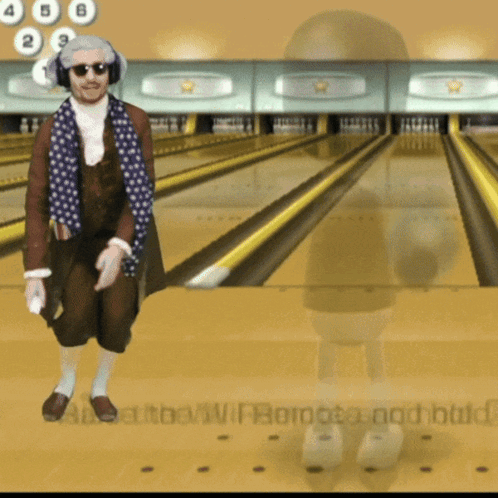 a man in a bowling alley wearing headphones and sunglasses