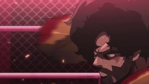 A Man In A Boxing Ring Has Blood Coming Out Of His Face GIF