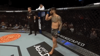 A Man In A Boxing Ring With A Sign That Says Visit Abdul GIF