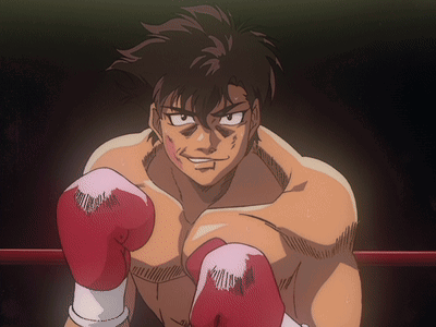 A Man In A Boxing Ring With Red Boxing Gloves On GIF