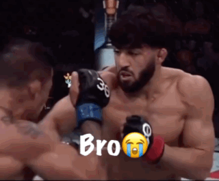 A Man In A Boxing Ring With The Word Bro Written On The Screen GIF
