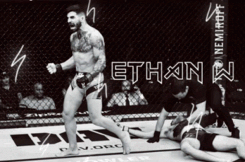 A Man In A Boxing Ring With The Word Ethan On The Wall GIF