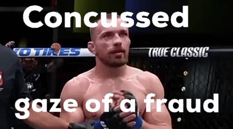 A Man In A Boxing Ring With The Words " Concused Gaze Of A Fraud " Below Him GIF