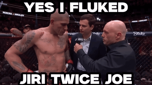 A Man In A Boxing Ring With The Words " Yes I Fluked Jiri Twice Joe " Above Him GIF