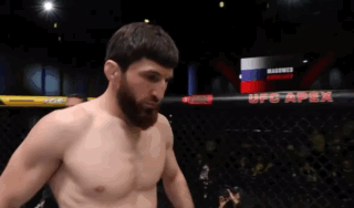 A Man In A Boxing Ring With Ufc Apex In The Background GIF