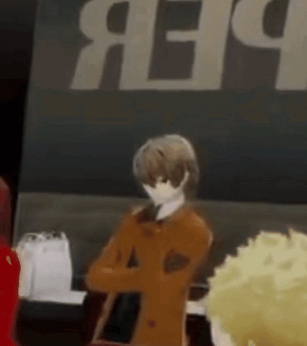 A Man In A Brown Coat Is Standing In Front Of A Sign That Says ' Aep ' On It . GIF
