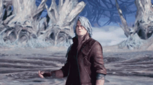 A Man In A Brown Jacket Is Standing In A Field GIF