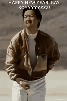 A Man In A Brown Jacket Is Standing In Front Of A Sign That Says Happy New Year ! GIF