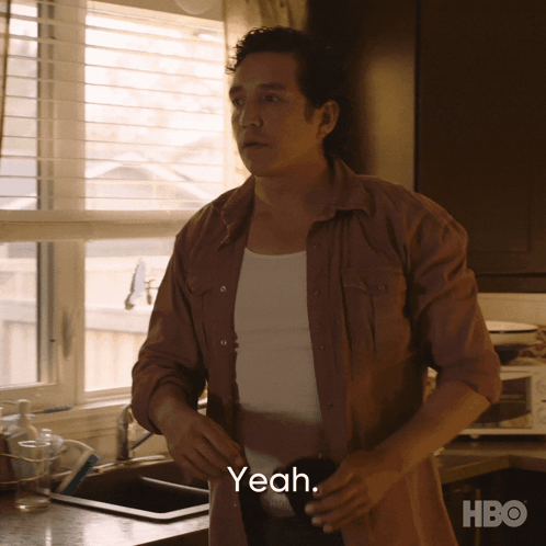 A Man In A Brown Shirt Says Yeah GIF