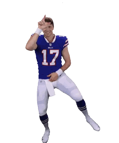 a man in a buffalo bills jersey dancing