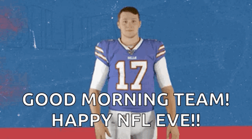 A Man In A Buffalo Bills Jersey Is Waving His Hand GIF