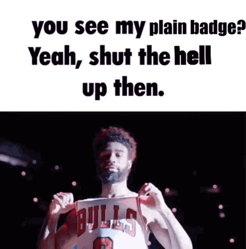 A Man In A Bulls Jersey Has His Fist Up In The Air GIF
