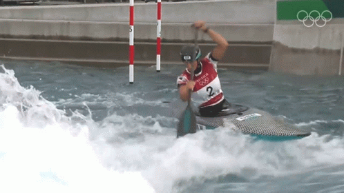 A Man In A Canoe With The Number 2 On His Shirt GIF