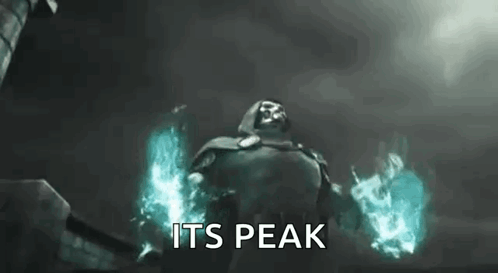 A Man In A Cape Is Holding A Fireball In His Hands And Says `` Its Peak '' . GIF