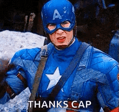 A Man In A Captain America Costume Is Standing In Front Of A Pile Of Snow And Says `` Thanks Cap '' . GIF