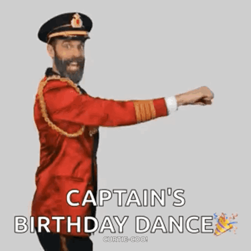 A Man In A Captain 'S Uniform Is Dancing . GIF
