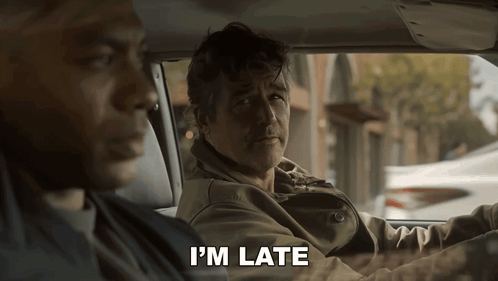 a man in a car says " i 'm late " to another man