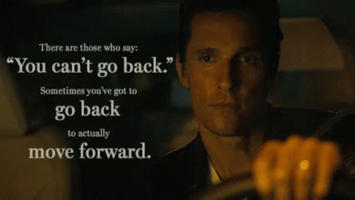 a man in a car with a quote that says " you can t go back "