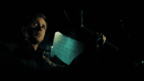 A Man In A Car With The Word Drive Written On The Screen GIF