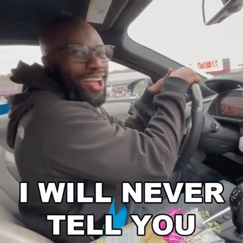 A Man In A Car With The Words " I Will Never Tell You " GIF