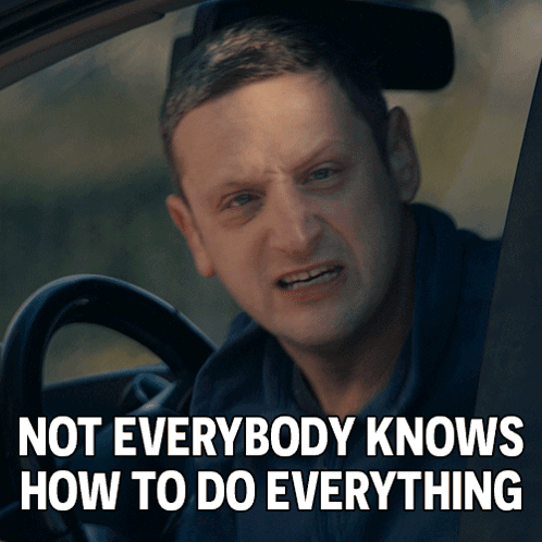 A Man In A Car With The Words " Not Everybody Knows How To Do Everything " Above Him GIF
