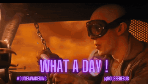 A Man In A Car With The Words What A Day Written On The Screen GIF