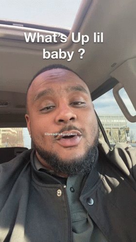 A Man In A Car With The Words What 'S Up Lil Baby GIF