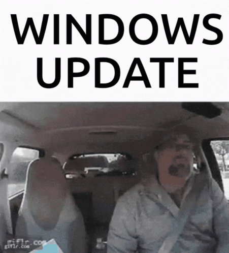 A Man In A Car With The Words Windows Update On The Top GIF