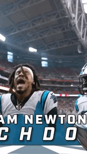 A Man In A Carolina Panthers Jersey Is Yelling In A Stadium GIF