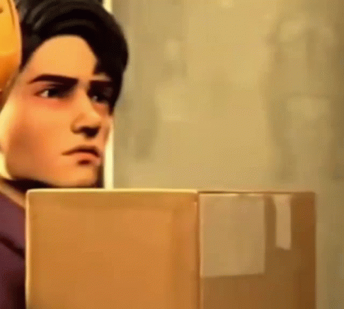 A Man In A Cartoon Is Standing Next To A Cardboard Box . GIF