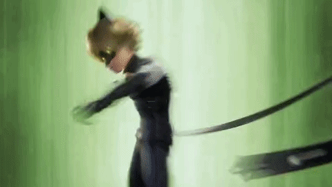 A Man In A Catsuit Is Standing In Front Of A Green Background And Holding A Sword . GIF