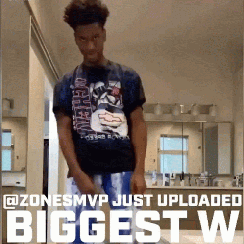 A Man In A Chevrolet Shirt Is Standing In A Bathroom With The Caption " Zone Smvp Just Uploaded Biggest W " GIF