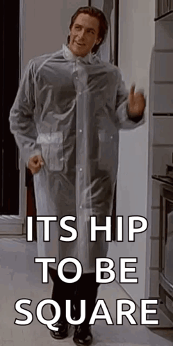 A Man In A Clear Plastic Raincoat Is Standing In Front Of A Refrigerator . GIF