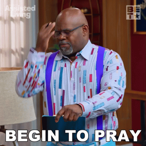 A Man In A Colorful Shirt And Suspenders Is Holding A Book And Says Begin To Pray GIF