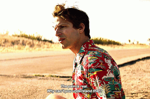 a man in a colorful shirt says the pain is real why can 't you understand that