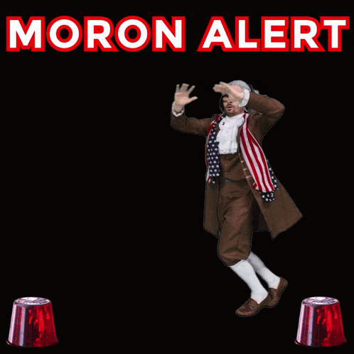 A Man In A Costume Is Dancing In Front Of A Sign That Says " Moron Alert " GIF