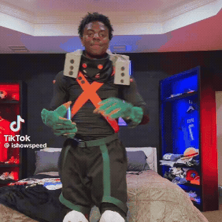 a man in a costume is standing in front of a bed with a tiktok logo on the bottom right