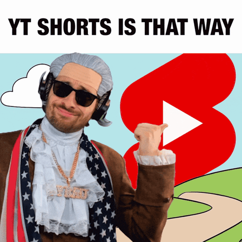 A Man In A Costume With The Words Yt Shorts Is That Way Below Him GIF