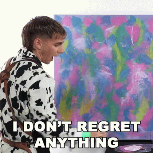 A Man In A Cow Print Jacket Is Painting A Picture And Says `` I Don T Regret Anything '' . GIF