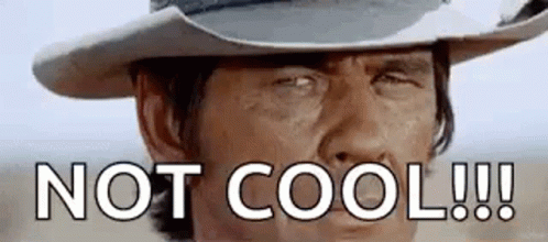 A Man In A Cowboy Hat Is Making A Funny Face And Saying `` Not Cool !!! '' . GIF