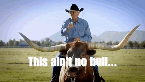 A Man In A Cowboy Hat Is Riding A Bull With The Words This Ain T No Bull GIF