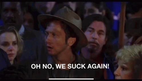 A Man In A Cowboy Hat Is Saying Oh No We Suck Again GIF