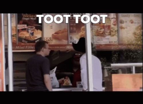 A Man In A Cowboy Hat Is Standing In Front Of A Fast Food Restaurant And Says Toot Toot GIF