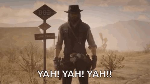 A Man In A Cowboy Hat Is Standing In Front Of A Sign That Says Tumbleweed GIF