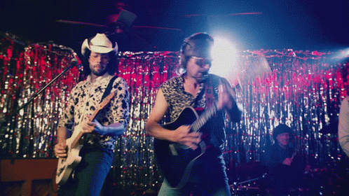 Man In Cowboy Hat Playing Guitar GIF