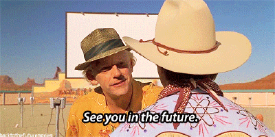 A Man In A Cowboy Hat Says " See You In The Future " While Another Man Looks On GIF