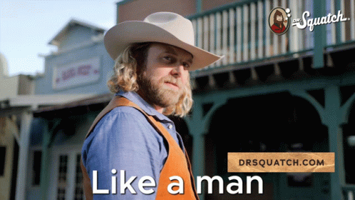 A Man In A Cowboy Hat With The Words Like A Man On The Bottom GIF